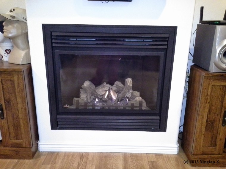 It even has a fake fireplace. Unfortunately, it's also the only vent in the whole room.