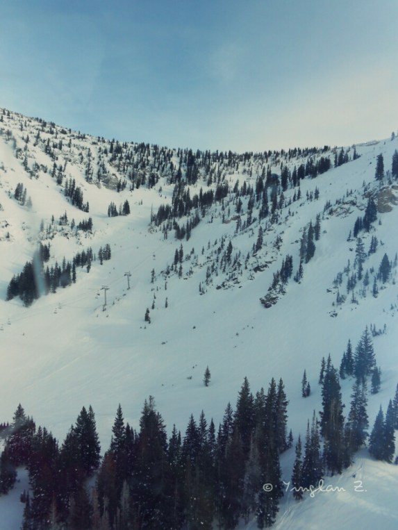 Up on a high mountain. There's just something about it, maybe it's the wind blowing through my hair?